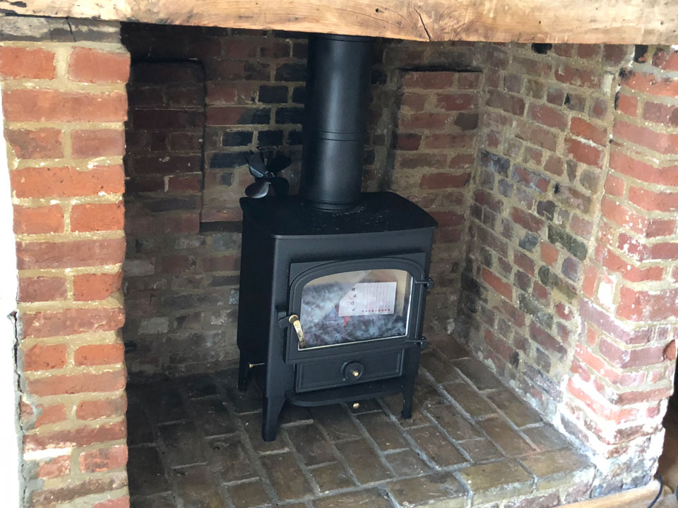 New wood burning stove install in a thatch property